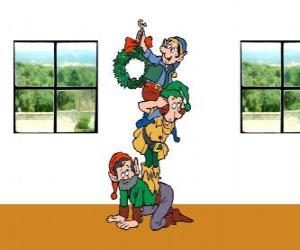 Three elves of Santa Claus hanging a Christmas wreath puzzle