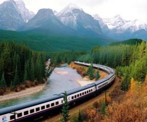 Train passengers in a mountainous Landscape puzzle