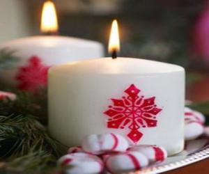 Two large Christmas candles burning puzzle