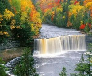 View of a river that goes to a waterfall puzzle