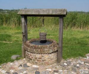 Water well cylindrical shape made of stone puzzle