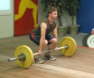 Weightlifting - Weightlifter in the beginning of the exercise puzzle