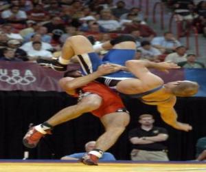 Wrestling - Two wrestlers and a referee in a fight puzzle